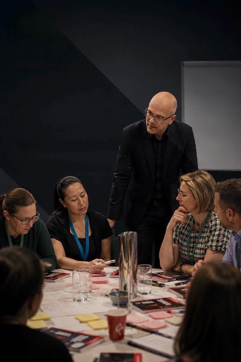 Image of a workshop table with Thomas Barta